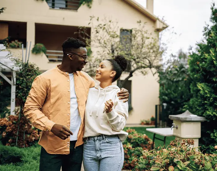 Young couple with new home