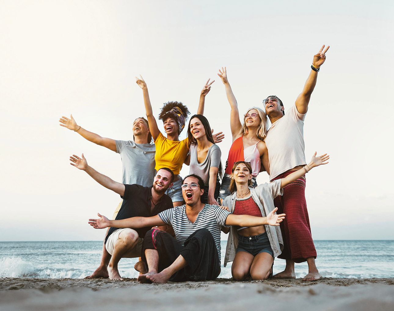 Group of happy friends on a beach