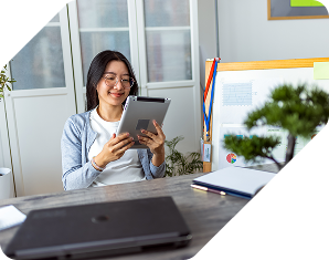 A woman looking at her tablet
